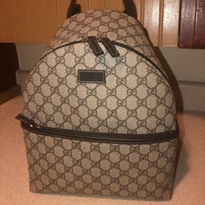 GUCCI- Children’s GG supreme backpack